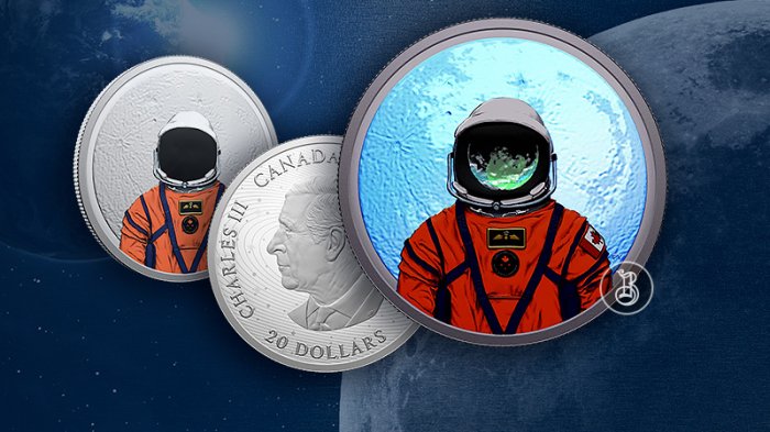 Монета, посвященная лунной миссии, с УФ-активируемым покрытием